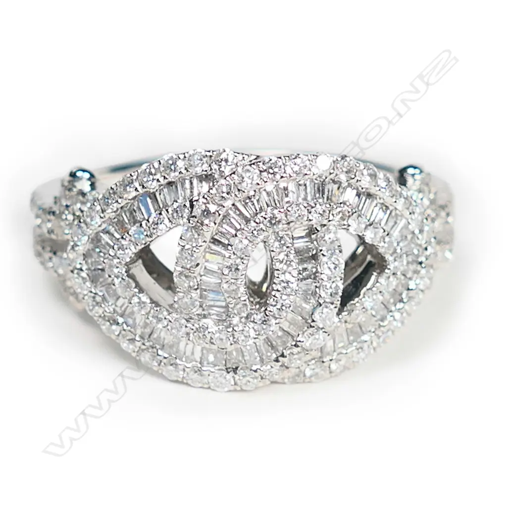 An 18ct white gold and multi diamond ring, Image 1++