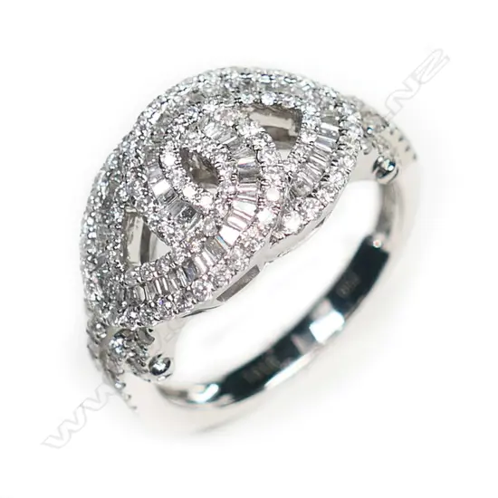 An 18ct white gold and multi diamond ring,