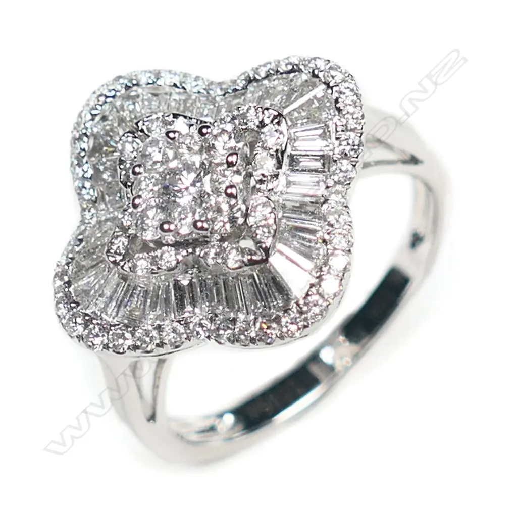 An 18ct white gold and multi diamond ring, Image 1++