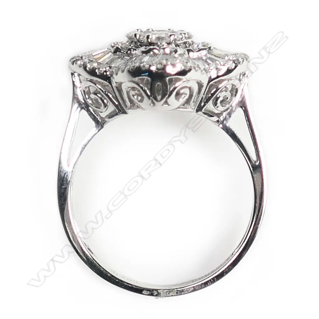An 18ct white gold and multi diamond ring, Image 1++