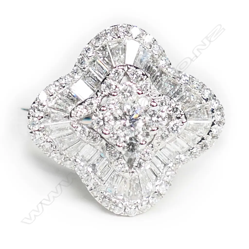 An 18ct white gold and multi diamond ring, Image 1++