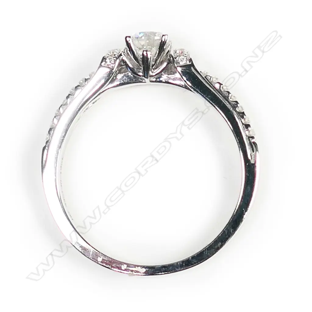 An 18ct white gold and diamond solitaire ring, Image 1++