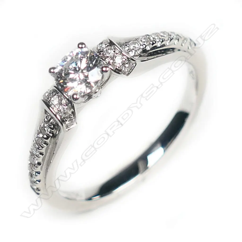 An 18ct white gold and diamond solitaire ring, Image 1++