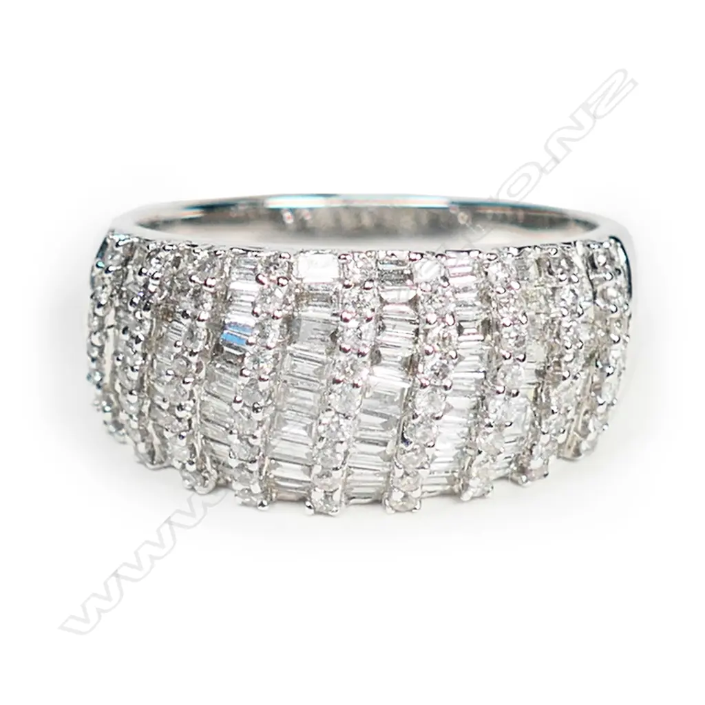 An 18ct white gold and multi diamond wide band ring, Image 1++