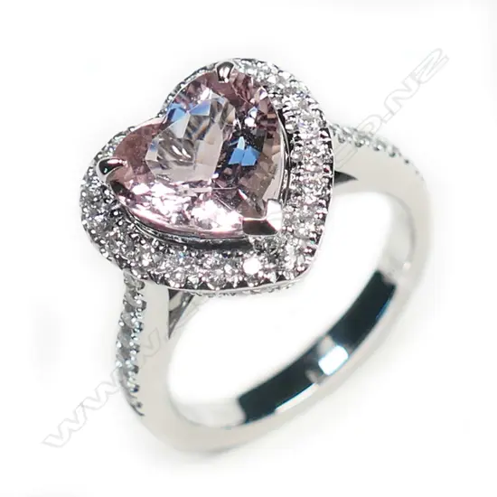 An 18ct white gold morganite and diamond cluster ring,