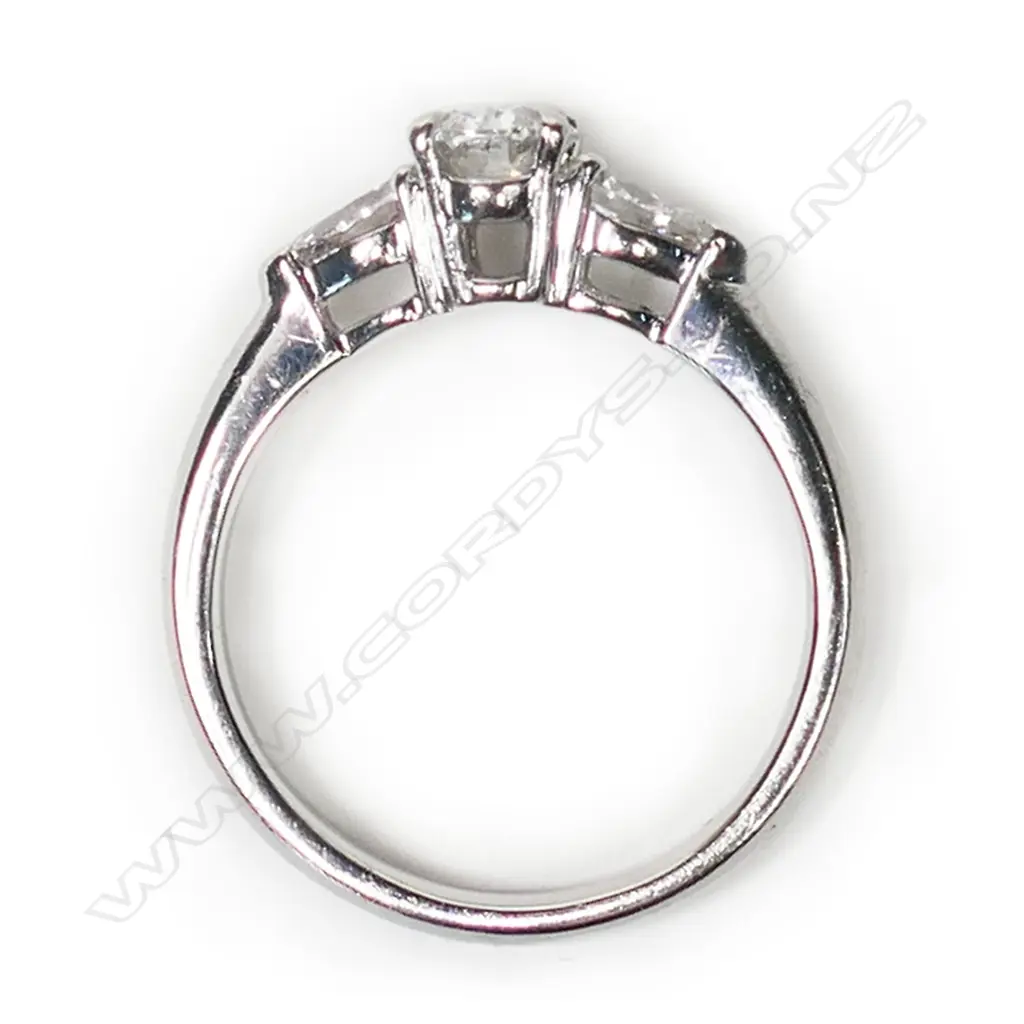 A platinum and diamond ring, Image 1++