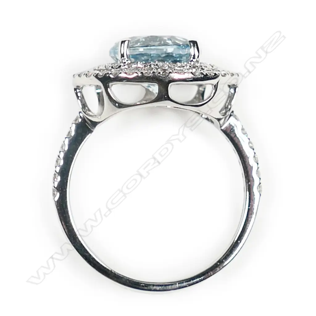 A 14ct white gold, aquamarine and diamond double halo ring, Image 1++