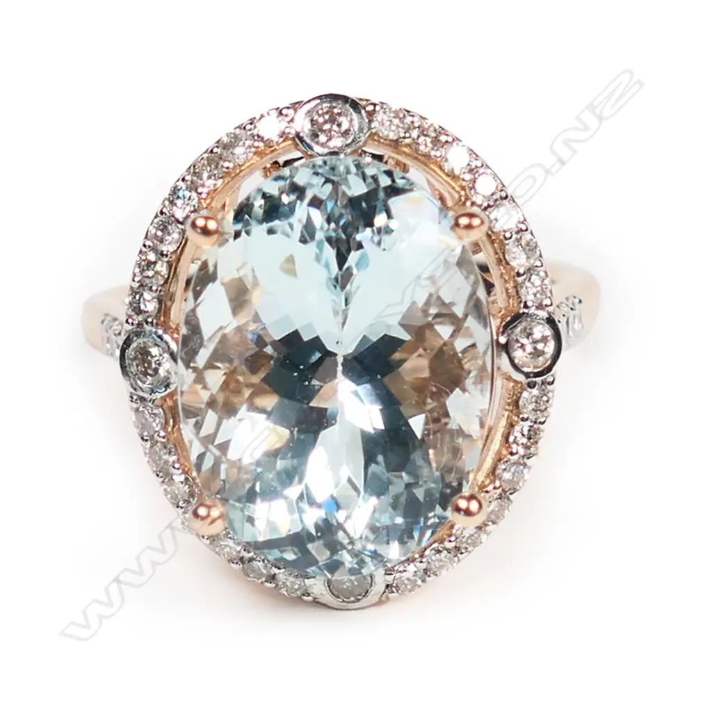 A 14ct rose gold, aquamarine and diamond vintage style halo ring, Image 1++