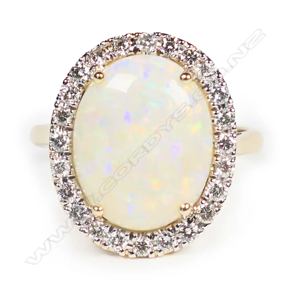 A 14ct gold, Coober Pedy opal and diamond vintage style halo ring, Image 1++