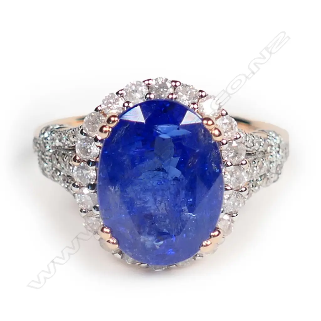 A 14ct rose gold, tanzanite and diamond vintage style halo ring, Image 1++