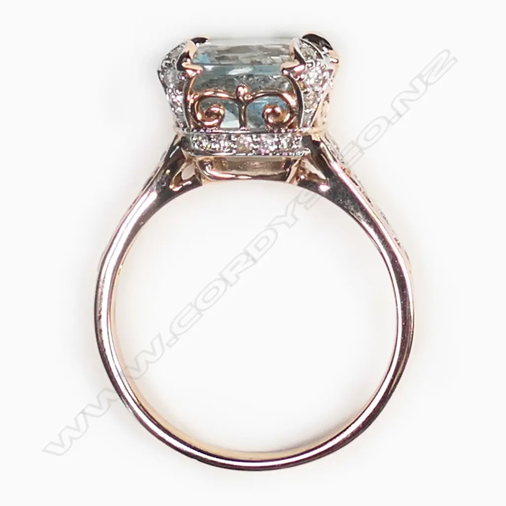 A 14ct rose gold, aquamarine and diamond dress ring, Image 1++