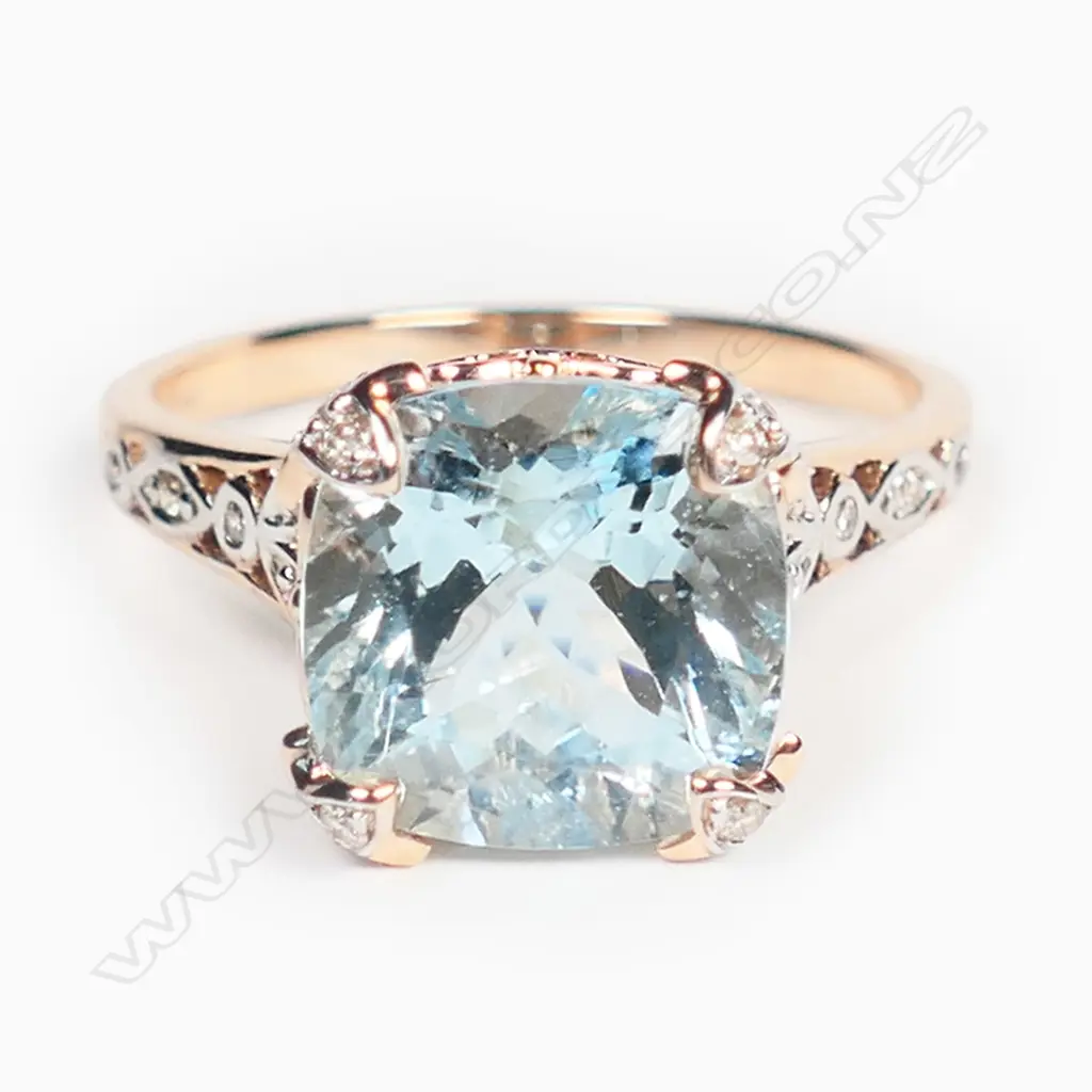 A 14ct rose gold, aquamarine and diamond dress ring, Image 1++