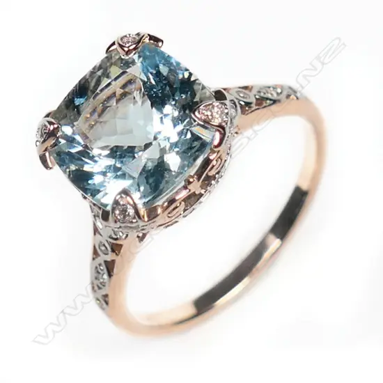 A 14ct rose gold, aquamarine and diamond dress ring,