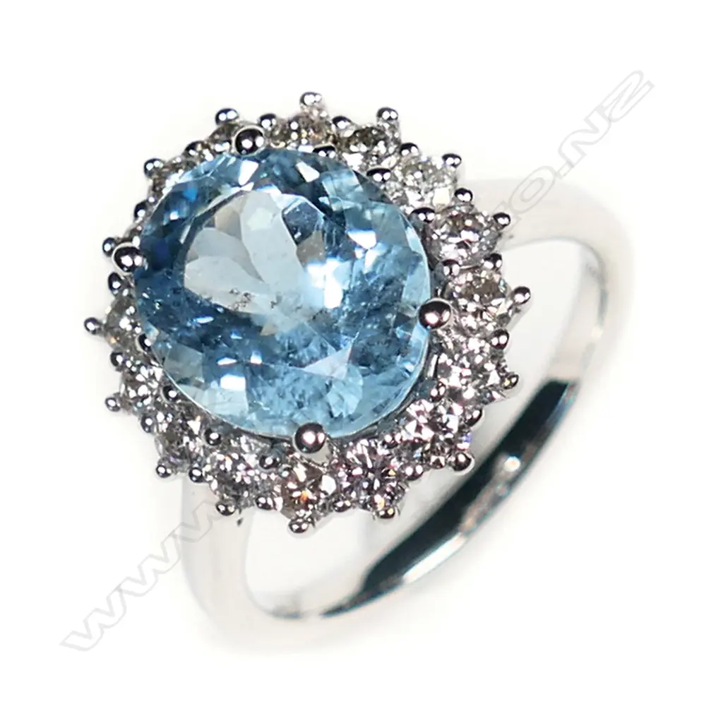 A 14ct white gold, aquamarine and diamond vintage style halo ring, Image 1++