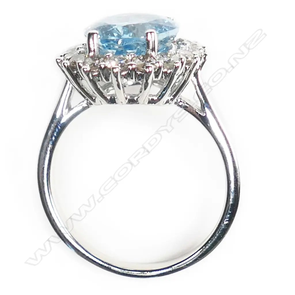 A 14ct white gold, aquamarine and diamond vintage style halo ring, Image 1++