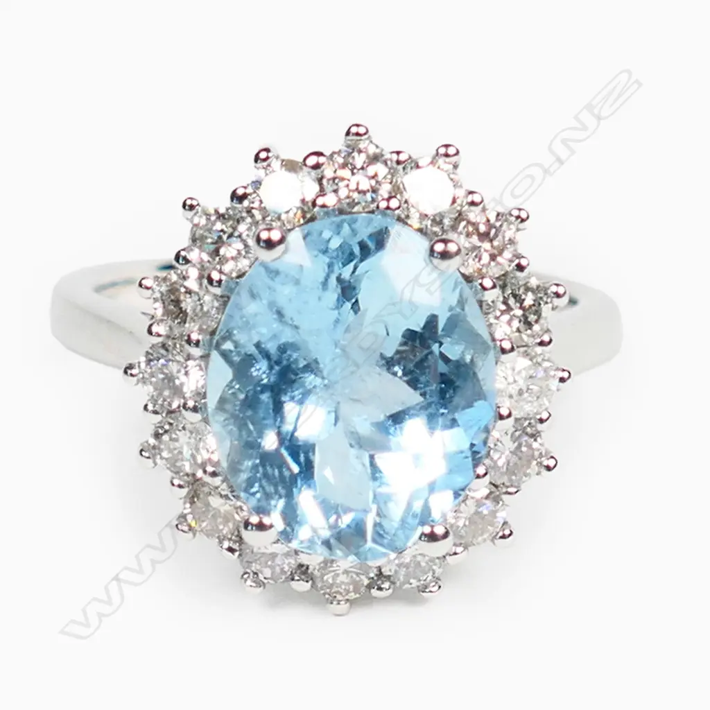 A 14ct white gold, aquamarine and diamond vintage style halo ring, Image 1++