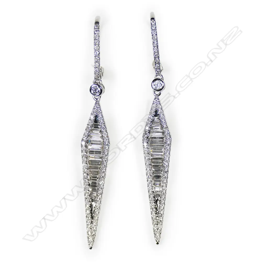 A pair of 18ct white gold and diamond drop earrings, Image 1++