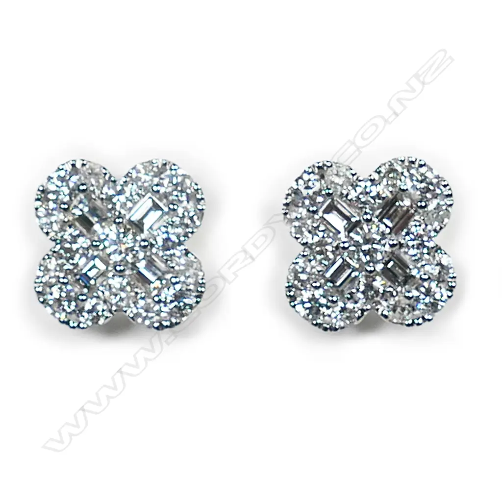 A pair of 18ct white gold and diamond earrings, Image 1++