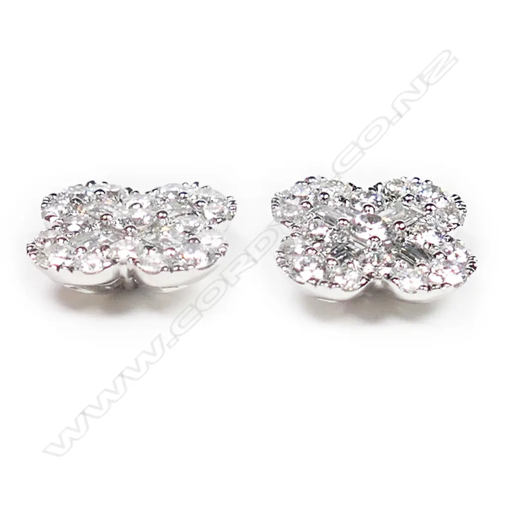 A pair of 18ct white gold and diamond earrings, Image 1++