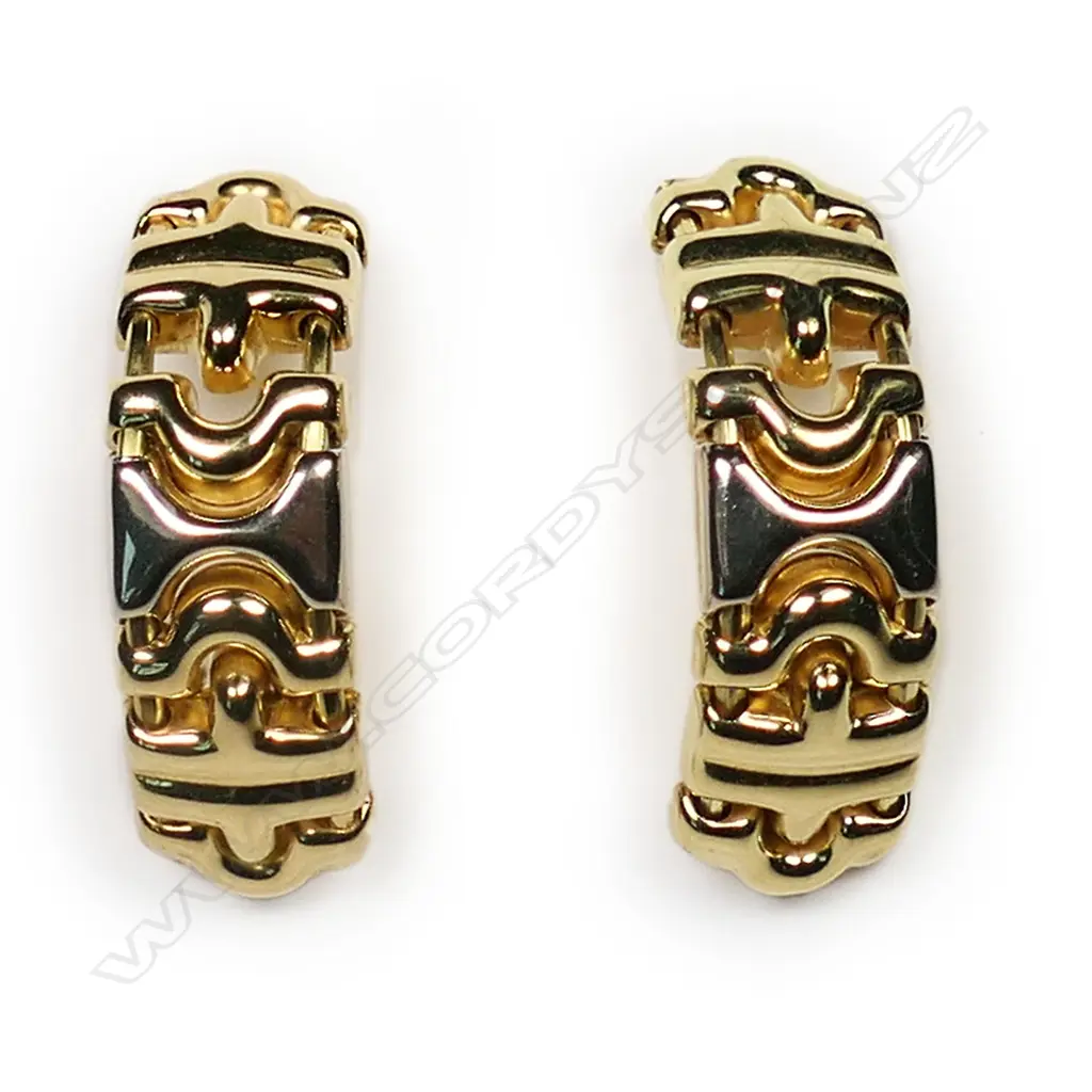 A pair of 18ct gold earrings in the style of Bulgari 'Parentesi', Image 1++