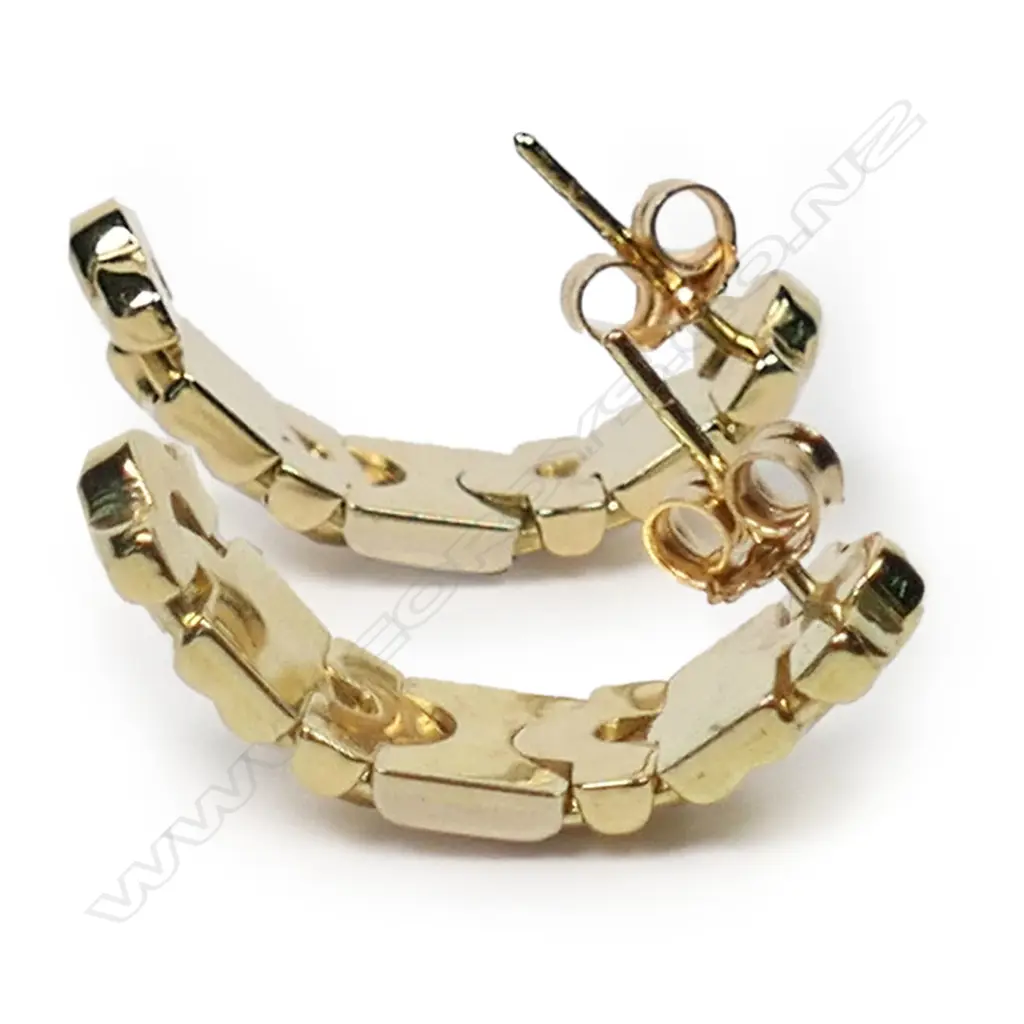 A pair of 18ct gold earrings in the style of Bulgari 'Parentesi', Image 1++