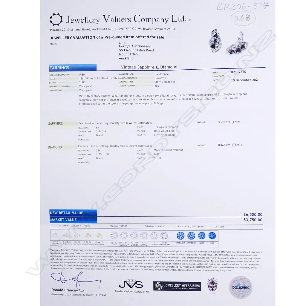 A pair of 18ct white gold sapphire and diamond earrings, Image 1++