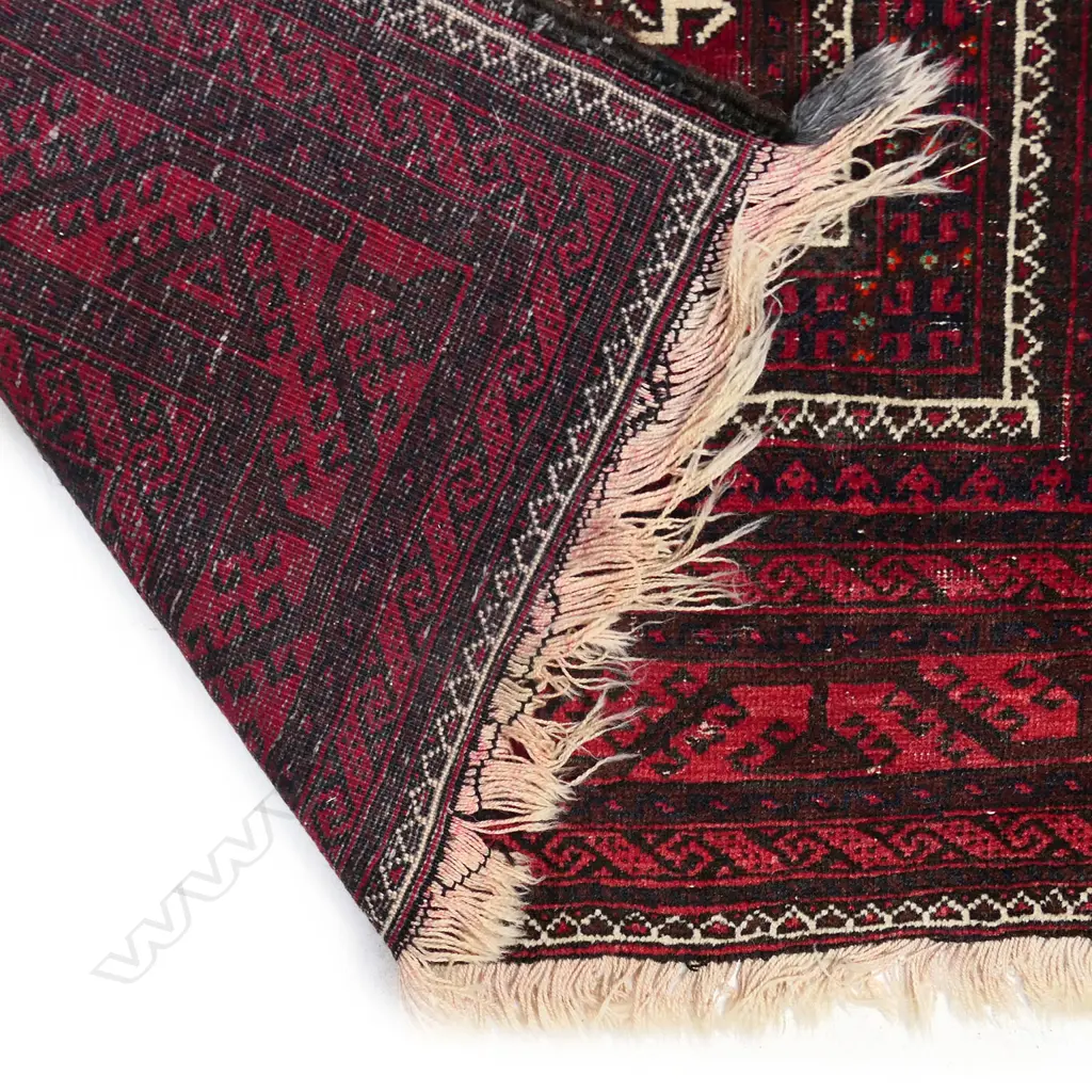 A Balouch tribal hand knotted rug, 210 x 118cm Image 1++