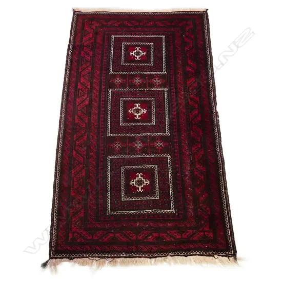 A Balouch tribal hand knotted rug, 210 x 118cm