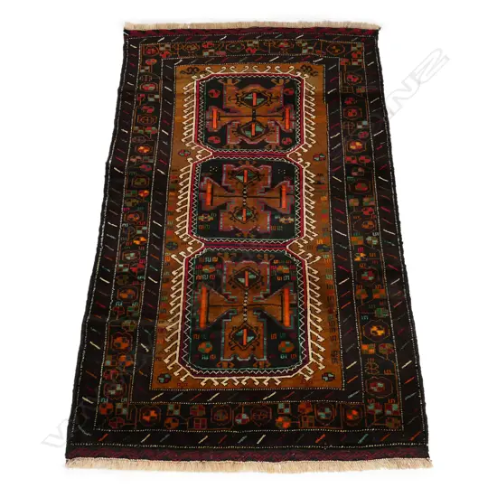 A Balouch hand knotted rug, 190 x 110cm