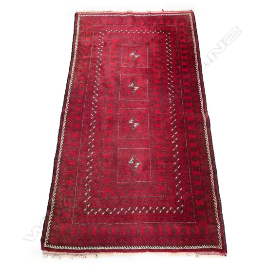 A hand knotted Turkoman rug, 120 x 230cm