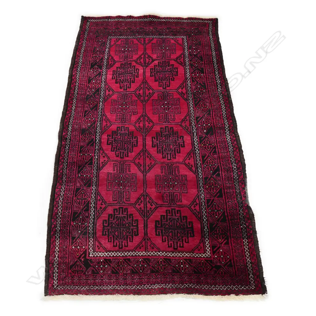 A hand knotted Turkoman rug, 120 x 225cm Image 1++