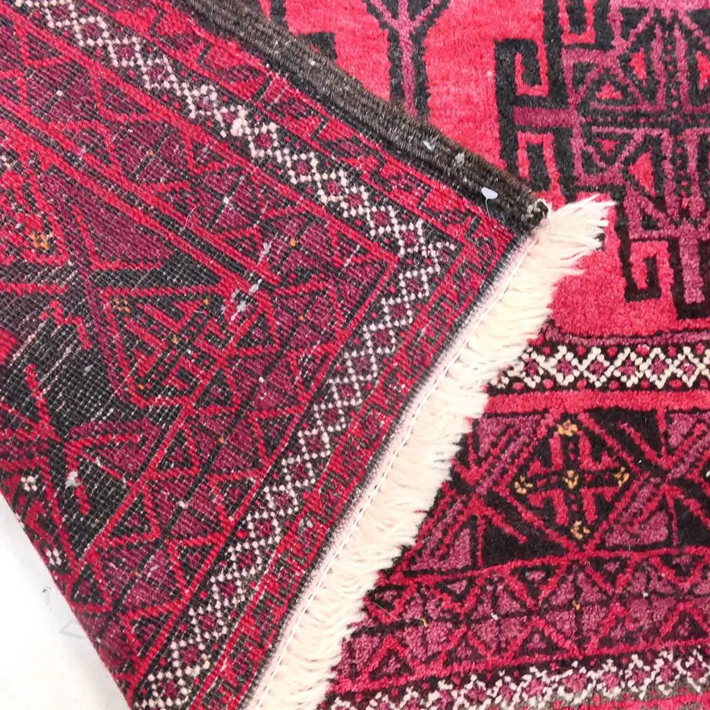 A hand knotted Turkoman rug, 120 x 225cm Image 1++