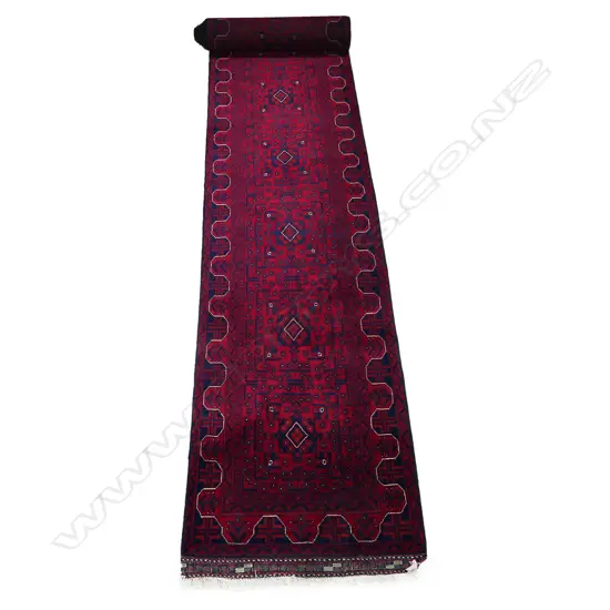 An impressive long Turkoman runner, 76 x 509cm.