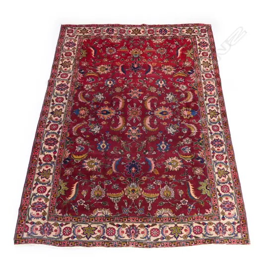 An Iranian hand knotted Tabriz carpet, 317 x 220cm,