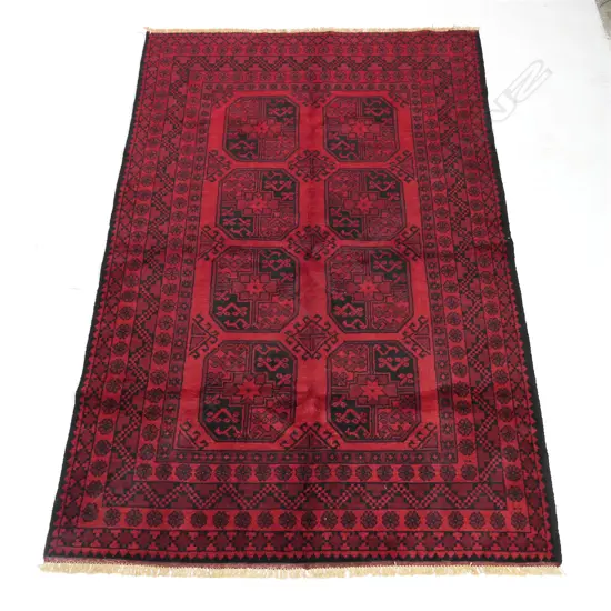 A fine hand knotted 'Elephant Foot' pattern carpet, 240 x 157cm
