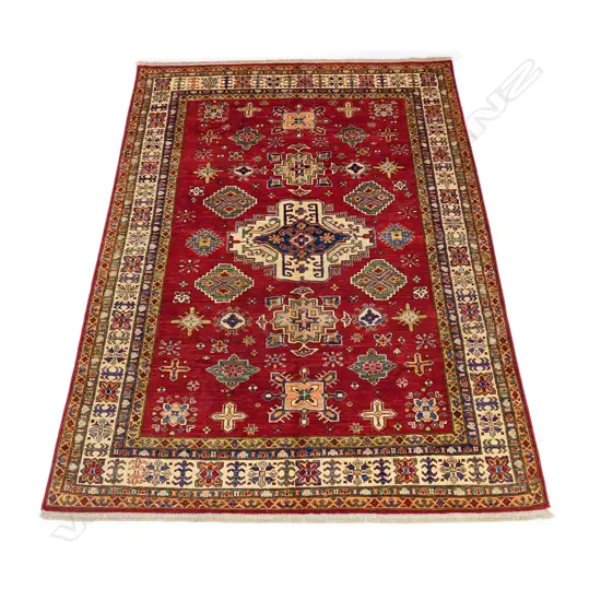 A good hand knotted tribal Kazak carpet 250 x 177cm