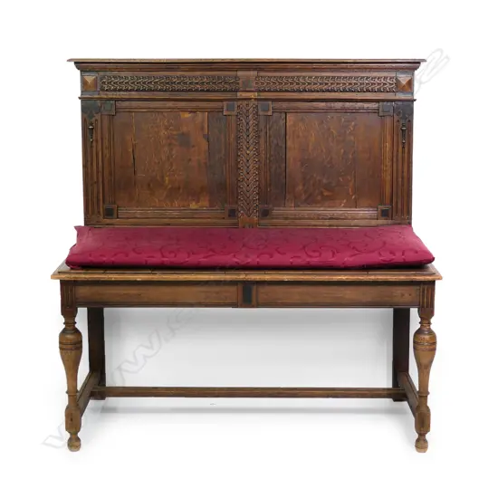 An oak Elizabethan style settle,