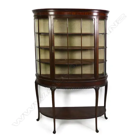An Edwardian mahogany demi-lune display cabinet, (ex Cordy’s Auctions)