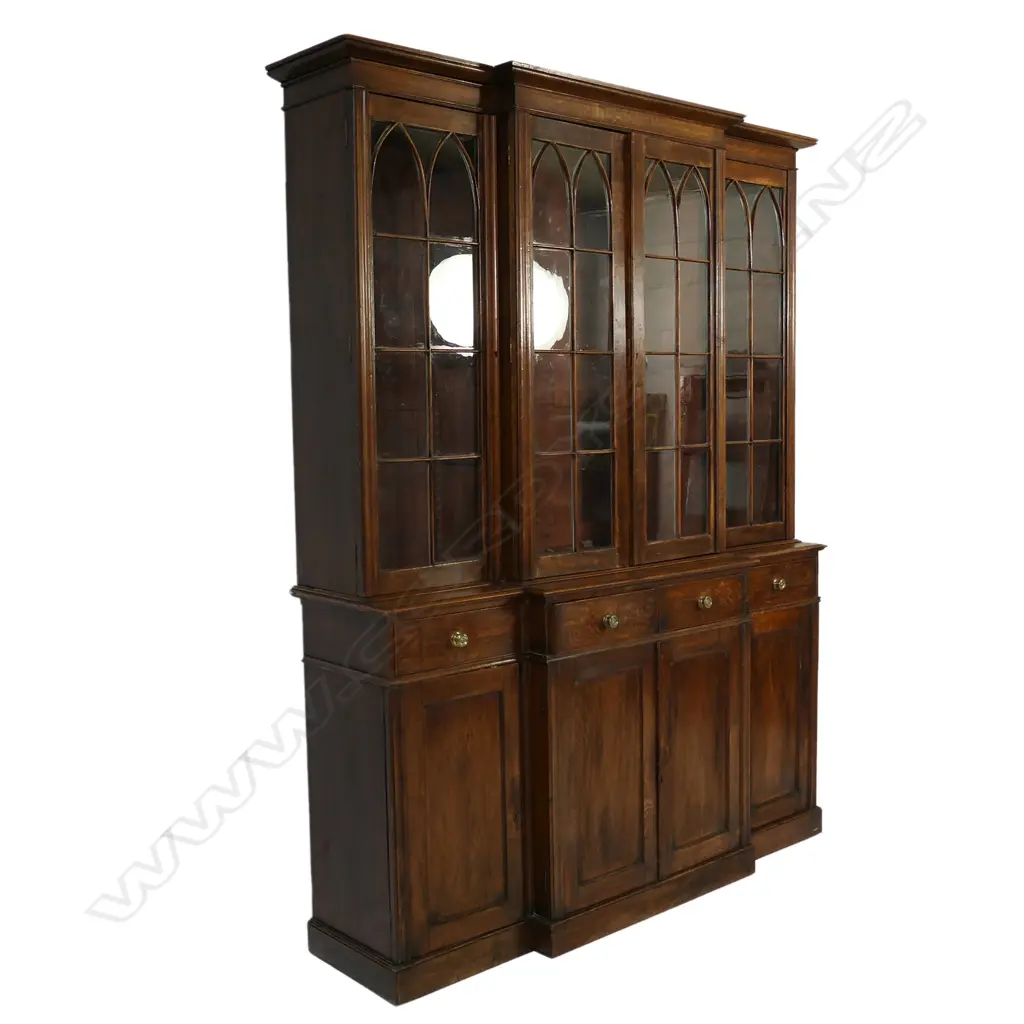An oak breakfront bookcase cabinet, Image 1++