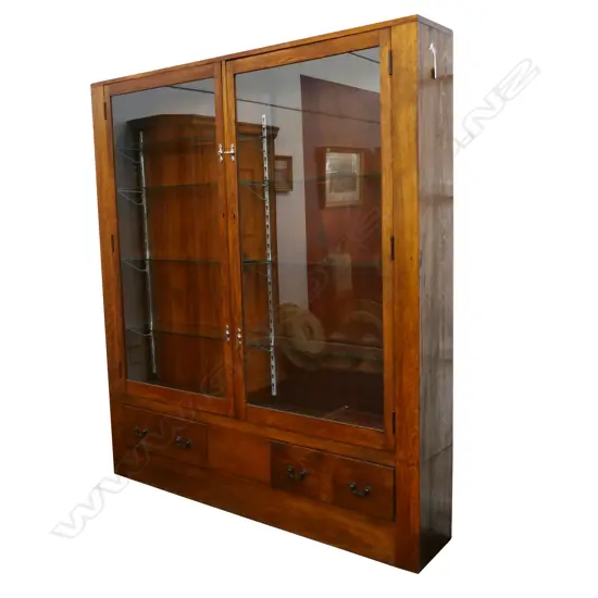 A 1920's large oak, glazed shop display cabinet,
