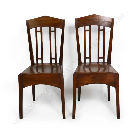 A pair of rimu Roy Lippincott lecture chairs,