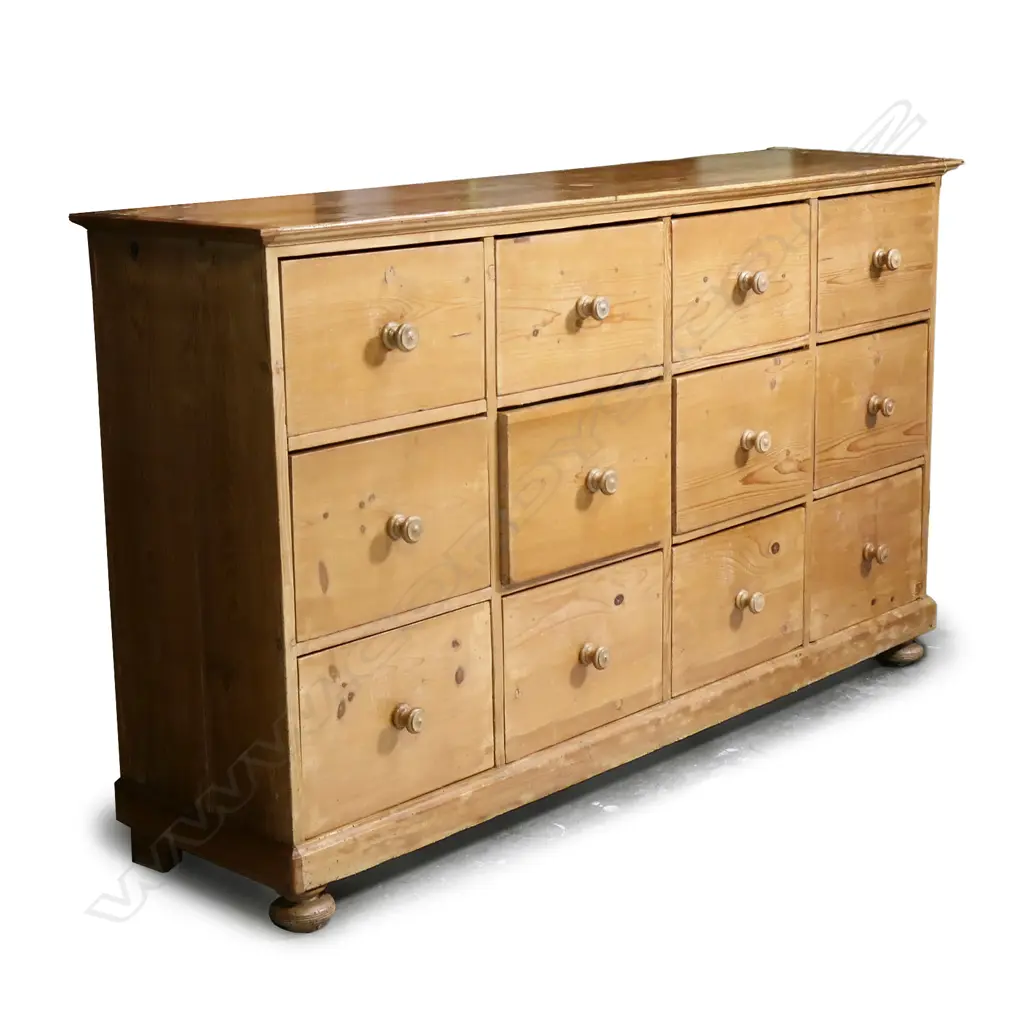 A grandly proportioned, pine multi drawer housekeeper’s chest of twelve drawers, Image 1++