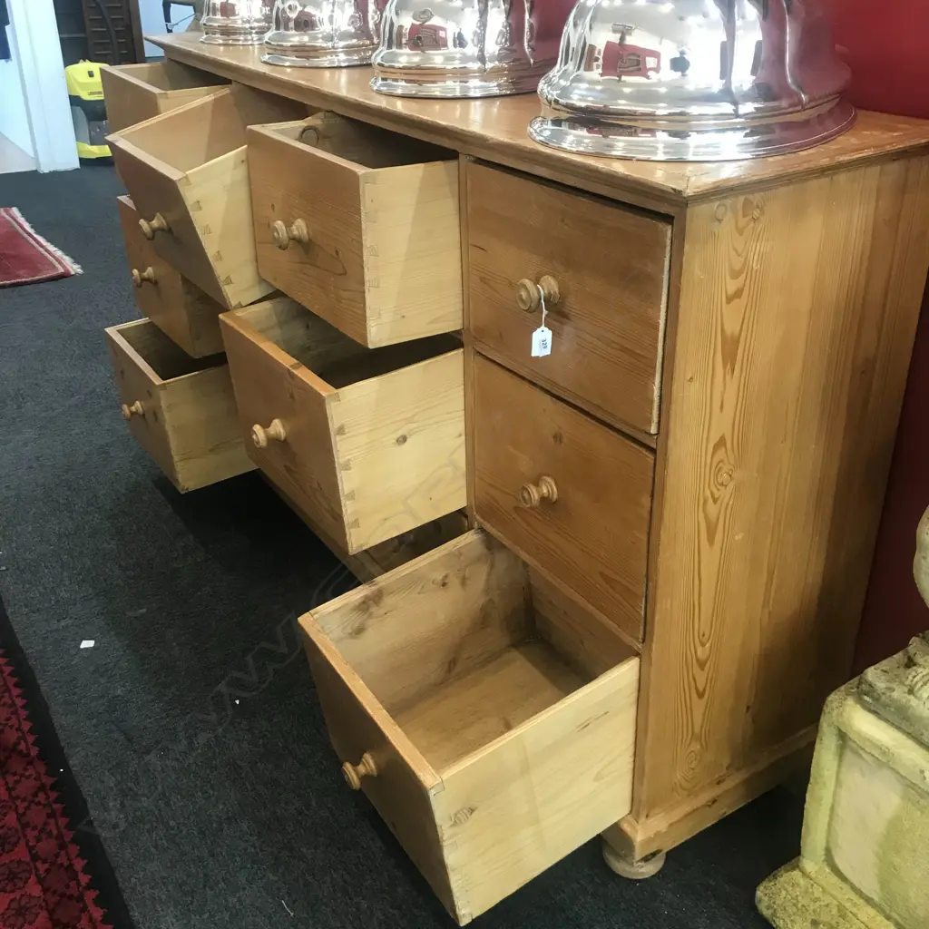 A grandly proportioned, pine multi drawer housekeeper’s chest of twelve drawers, Image 1++