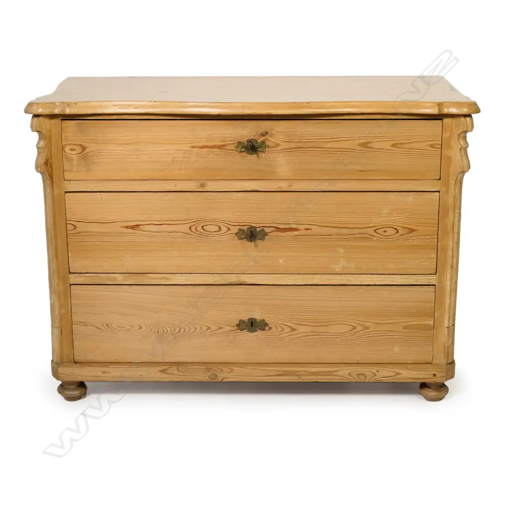 A European Biedermeier pine commode, of three graduated drawers, Image 1++