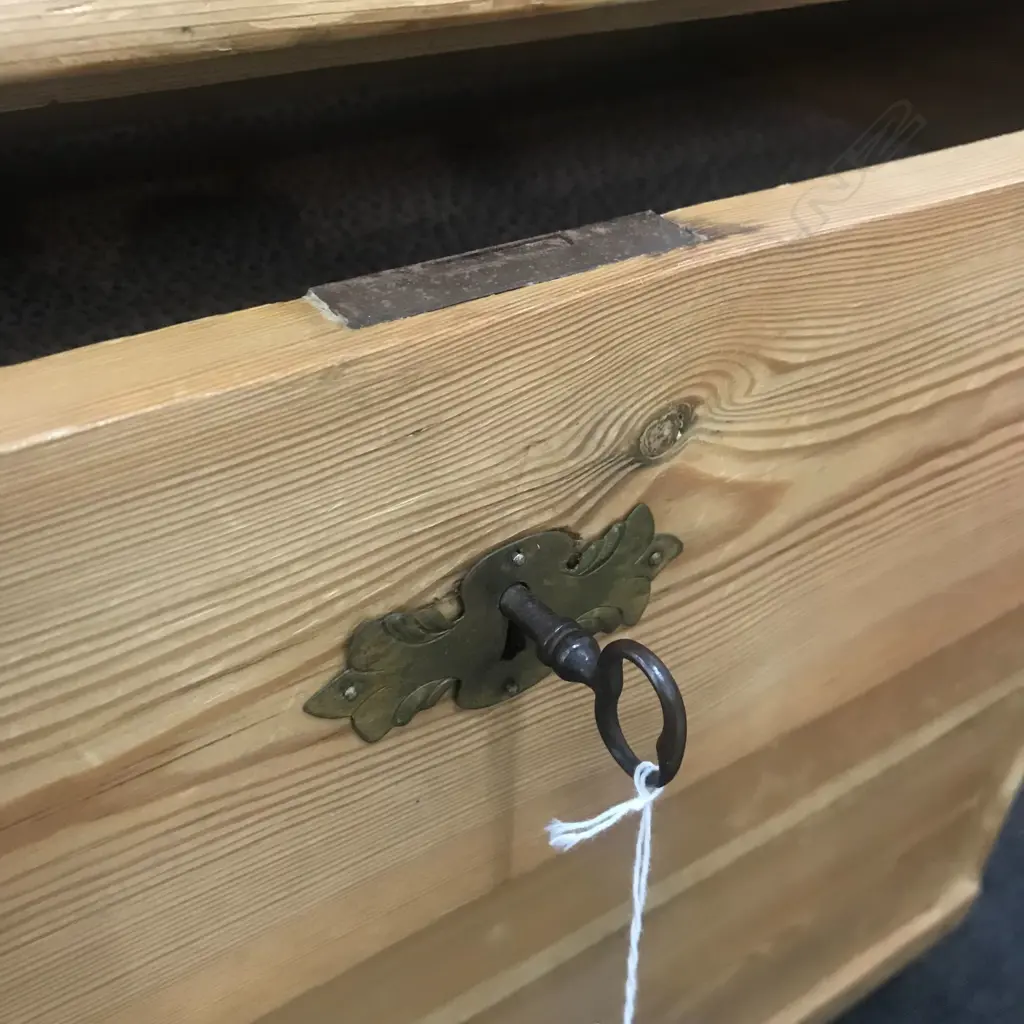 A European Biedermeier pine commode, of three graduated drawers, Image 1++