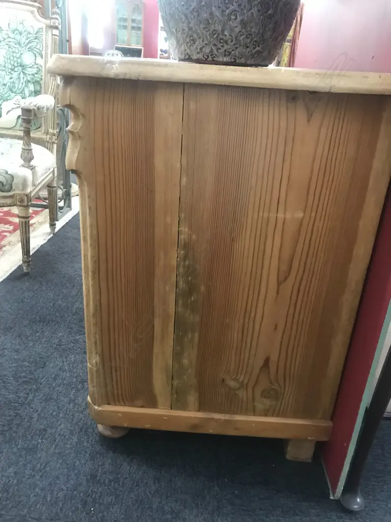 A European Biedermeier pine commode, of three graduated drawers, Image 1++
