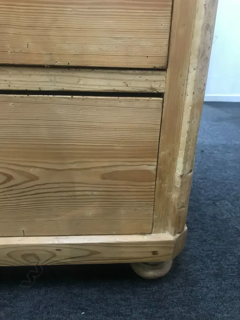 A European Biedermeier pine commode, of three graduated drawers, Image 1++