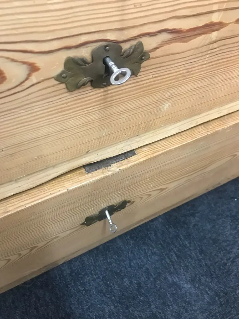 A European Biedermeier pine commode, of three graduated drawers, Image 1++