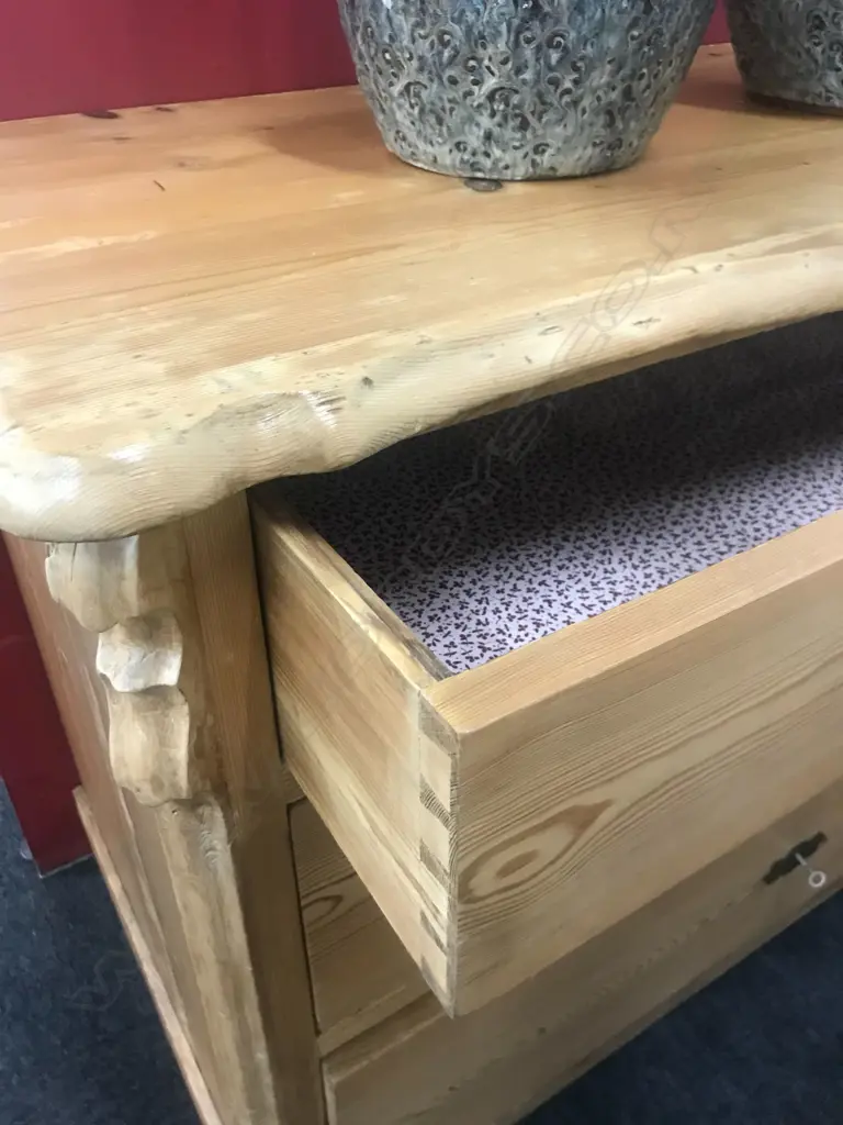 A European Biedermeier pine commode, of three graduated drawers, Image 1++