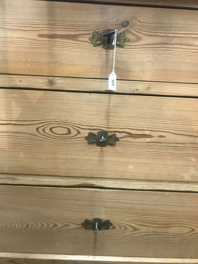 A European Biedermeier pine commode, of three graduated drawers, Image 1++